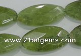 CGA104 15.5 inches 15*30mm faceted oval natural green garnet beads