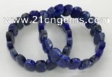 CGB3279 7.5 inches 10*15mm faceted oval lapis lazuli bracelets