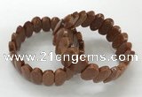 CGB3323 7.5 inches 10*20mm faceted oval goldstone bracelets