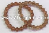 CGB4613 8mm - 9mm round golden rutilated quartz beaded bracelets