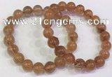 CGB4614 10mm - 11mm round golden rutilated quartz beaded bracelets