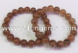 CGB4621 10mm - 11mm round golden rutilated quartz beaded bracelets