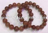 CGB4627 10mm - 11mm round red rutilated quartz beaded bracelets