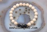 CGB6490 8mm round matte white fossil jasper & black lava beaded bracelets