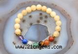 CGB6498 8mm round honey jade 7 chakra beads bracelet wholesale