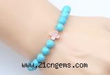 CGB9352 8mm, 10mm blue howlite & cross hematite power beads bracelets