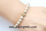 CGB9360 8mm, 10mm white fossil jasper & cross hematite power beads bracelets