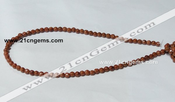 CGS57 15.5 inches 6mm faceted round goldstone beads wholesale