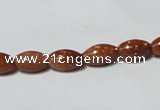 CGS69 15.5 inches 6*10mm rice goldstone beads wholesale