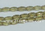 CLQ11 15.5 inches 8*12mm faceted rice natural lemon quartz beads