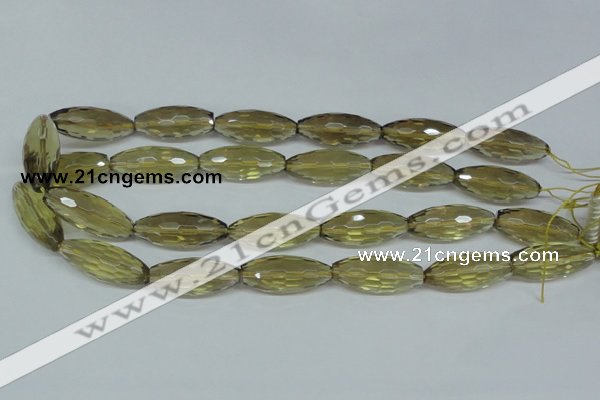 CLQ14 15.5 inches 12*30mm faceted rice natural lemon quartz beads