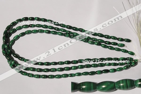 CMN210 15.5 inches 5*9mm rice natural malachite beads wholesale