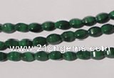 CMN222 15.5 inches 4*6mm faceted rice natural malachite beads