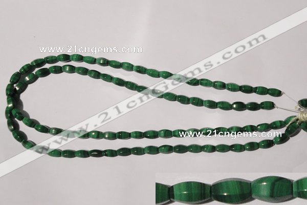 CMN223 15.5 inches 5*9mm faceted rice natural malachite beads