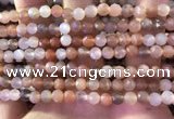 CMS1890 15.5 inches 5.5mm faceted round rainbow moonstone beads