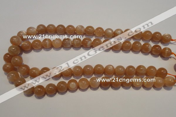 CMS704 15.5 inches 12mm round peach moonstone beads wholesale