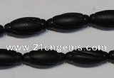 CNE15 15.5 inches 9*20mm carved rice black stone needle beads wholesale