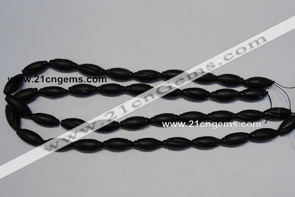 CNE15 15.5 inches 9*20mm carved rice black stone needle beads wholesale