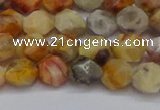 CNG6222 15.5 inches 6mm faceted nuggets yellow crazy lace agate beads