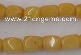 CNG807 15.5 inches 9*12mm faceted nuggets yellow jade beads