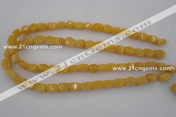 CNG807 15.5 inches 9*12mm faceted nuggets yellow jade beads