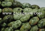 CPS10 15.5 inches 8*12mm rice green peacock stone beads wholesale