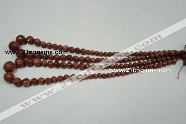 CRO736 15.5 inches 6mm – 14mm faceted round goldstone beads