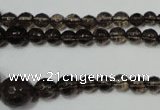 CRO743 15.5 inches 6mm – 14mm faceted round smoky quartz beads