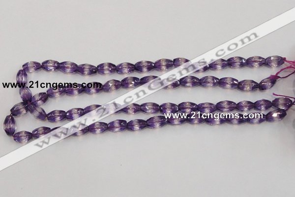 CSA25 15.5 inches 7*12mm faceted rice synthetic amethyst beads