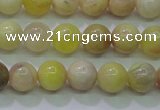 CSS600 15.5 inches 4mm round yellow sunstone gemstone beads