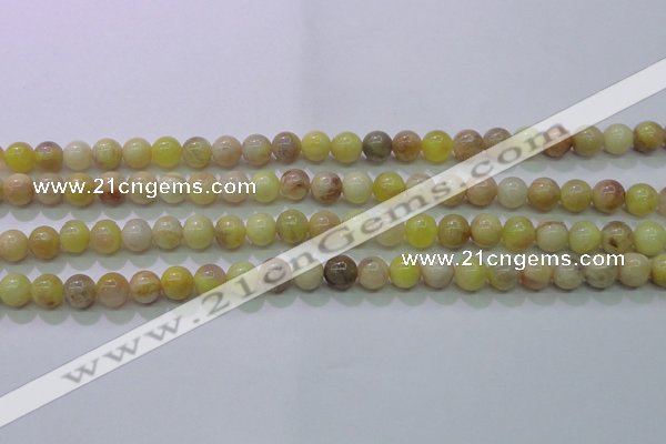 CSS600 15.5 inches 4mm round yellow sunstone gemstone beads