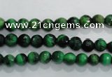 CTE1011 15.5 inches 6mm faceted round dyed green tiger eye beads