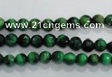 CTE1011 15.5 inches 6mm faceted round dyed green tiger eye beads