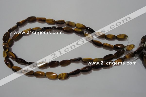 CTE1097 15.5 inches 8*15mm twisted & faceted oval yellow tiger eye beads