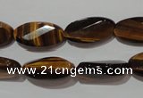 CTE1098 15.5 inches 10*20mm twisted & faceted oval yellow tiger eye beads