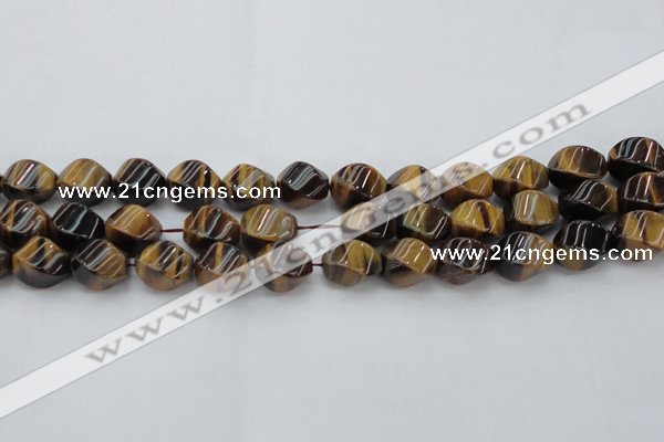 CTE1590 15.5 inches 10*14mm twisted rice yellow tiger eye beads