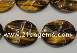 CTE832 15.5 inches 18*25mm wavy oval yellow tiger eye beads