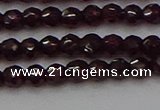 CTG555 15.5 inches 4mm faceted round tiny purple garnet beads