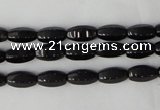 CTO116 15.5 inches 5*10mm faceted rice black tourmaline beads