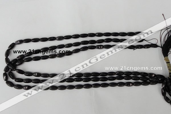 CTO116 15.5 inches 5*10mm faceted rice black tourmaline beads