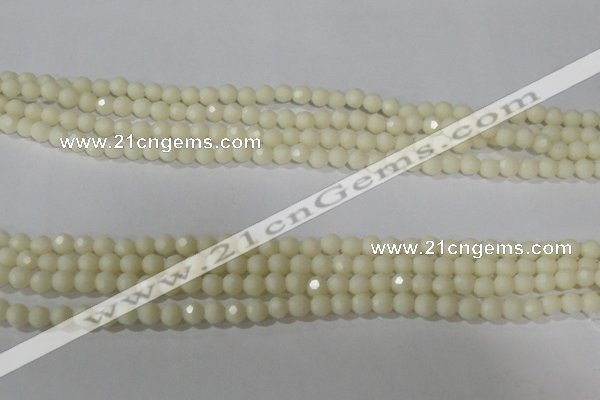 CTU1440 15.5 inches 4mm faceted round synthetic turquoise beads