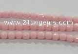 CTU1511 15.5 inches 4mm faceted round synthetic turquoise beads