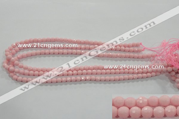 CTU1511 15.5 inches 4mm faceted round synthetic turquoise beads