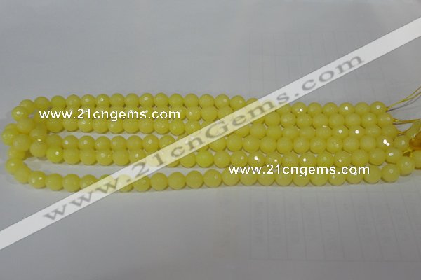 CTU2523 15.5 inches 4mm faceted round synthetic turquoise beads