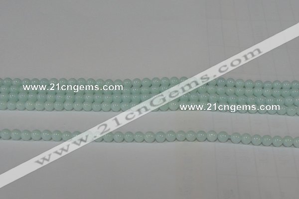 CTU2563 15.5 inches 4mm round synthetic turquoise beads