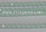 CTU2571 15.5 inches 4mm faceted round synthetic turquoise beads