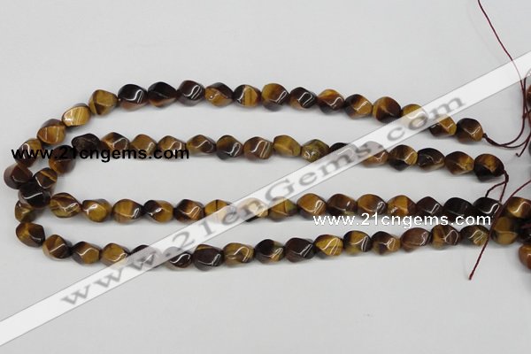 CTW151 15.5 inches 8*11mm twisted rice yellow tiger eye beads