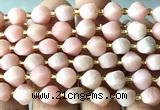 CTW604 8mm faceted & twisted S-shaped Chinese pink opal beads