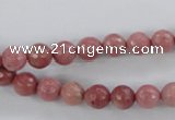 CWF01 15.5 inches 6mm faceted round pink wooden fossil jasper beads