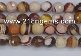 CZJ278 15.5 inches 4mm faceted round zebra jasper beads